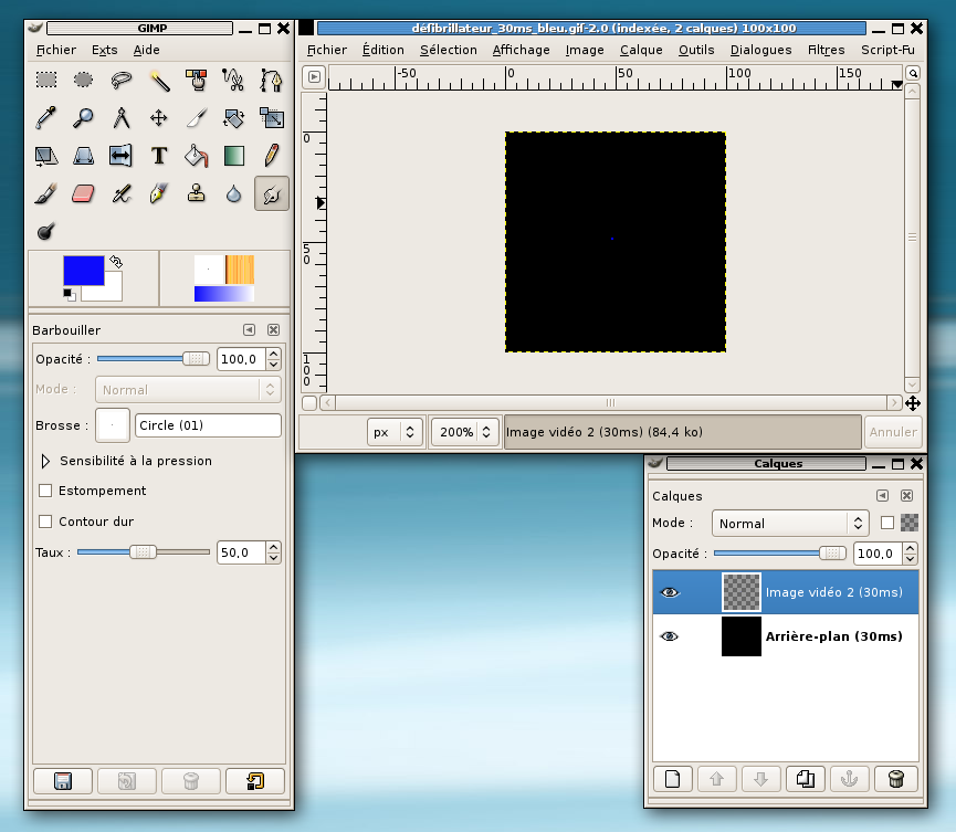 L'Écran principal de The Gimp, un écran d'édition d'une image noire avec un point bleu, l'écran de gestion des calques qui montre que deux calques sont présents.